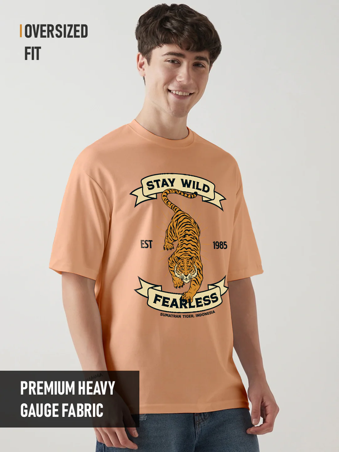 Stay Wild Graphic Printed Oversized T-Shirt - Peach Fuzz