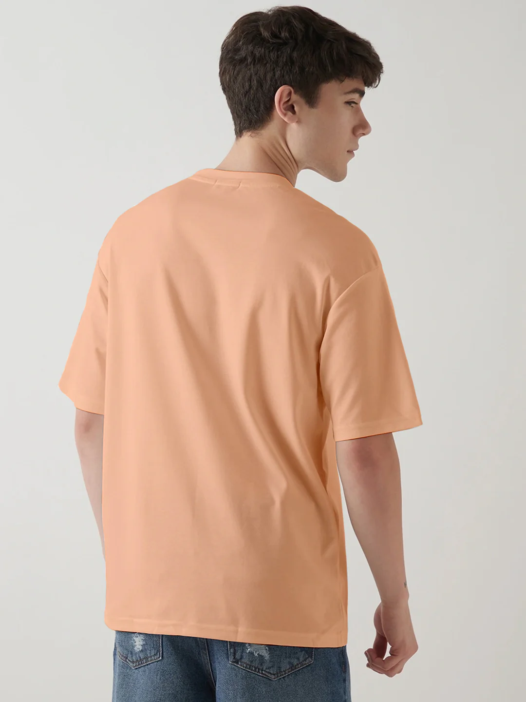Stay Wild Graphic Printed Oversized T-Shirt - Peach Fuzz - Image 2