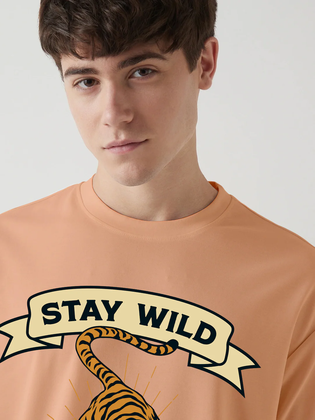 Stay Wild Graphic Printed Oversized T-Shirt - Peach Fuzz - Image 4